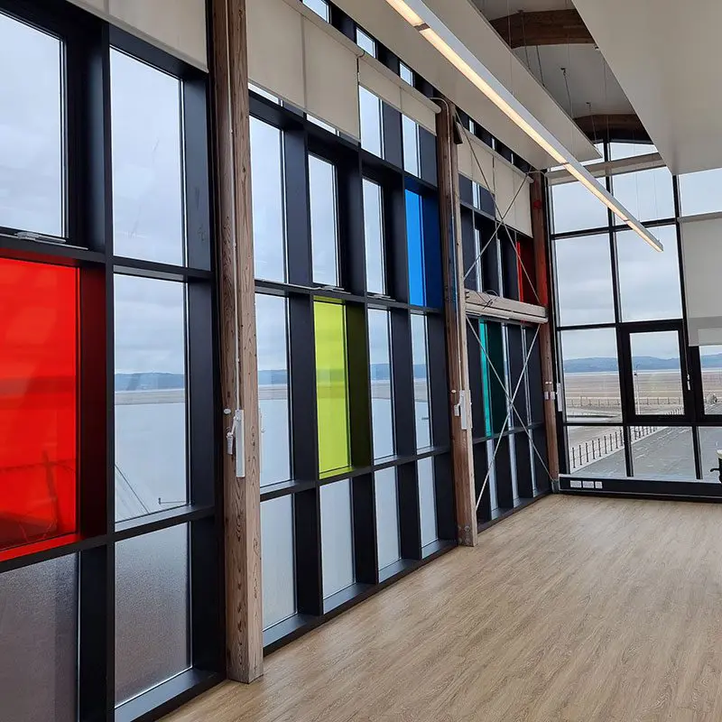 bespoke curtain walling project with coloured panels